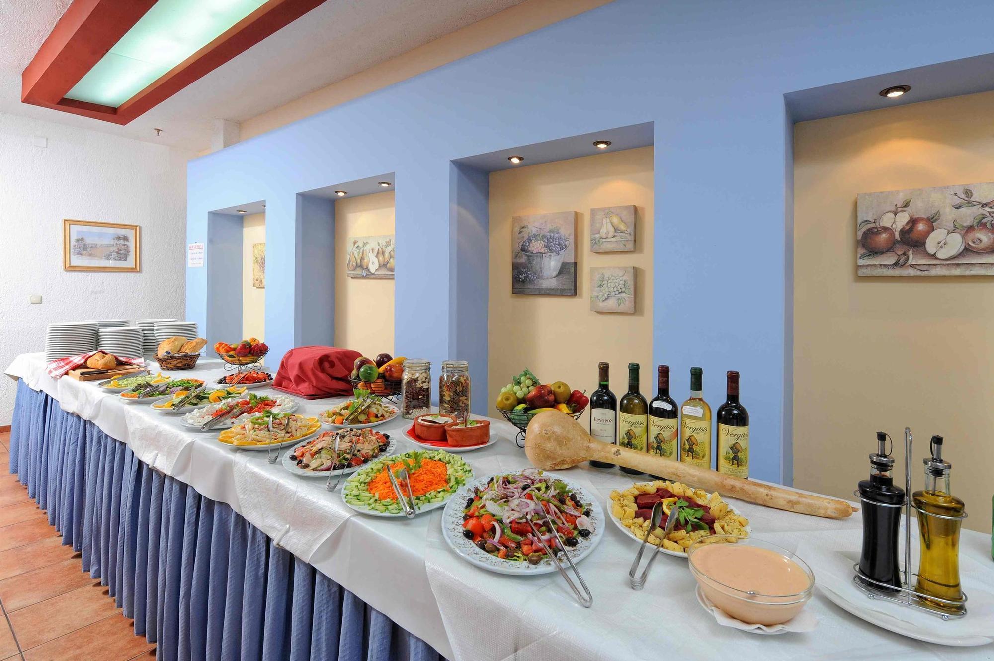 הרסוניסוס Agrabella Hotel מסעדה תמונה